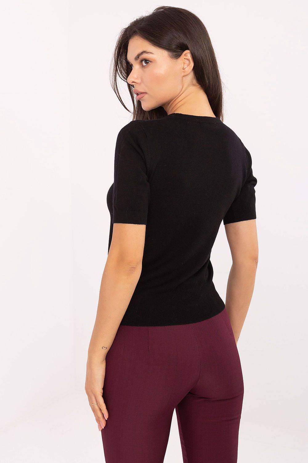 Close-up of Factory Price's exquisite classic women's sweater, featuring a smooth texture and versatile round neckline, perfect for stylish everyday wear.