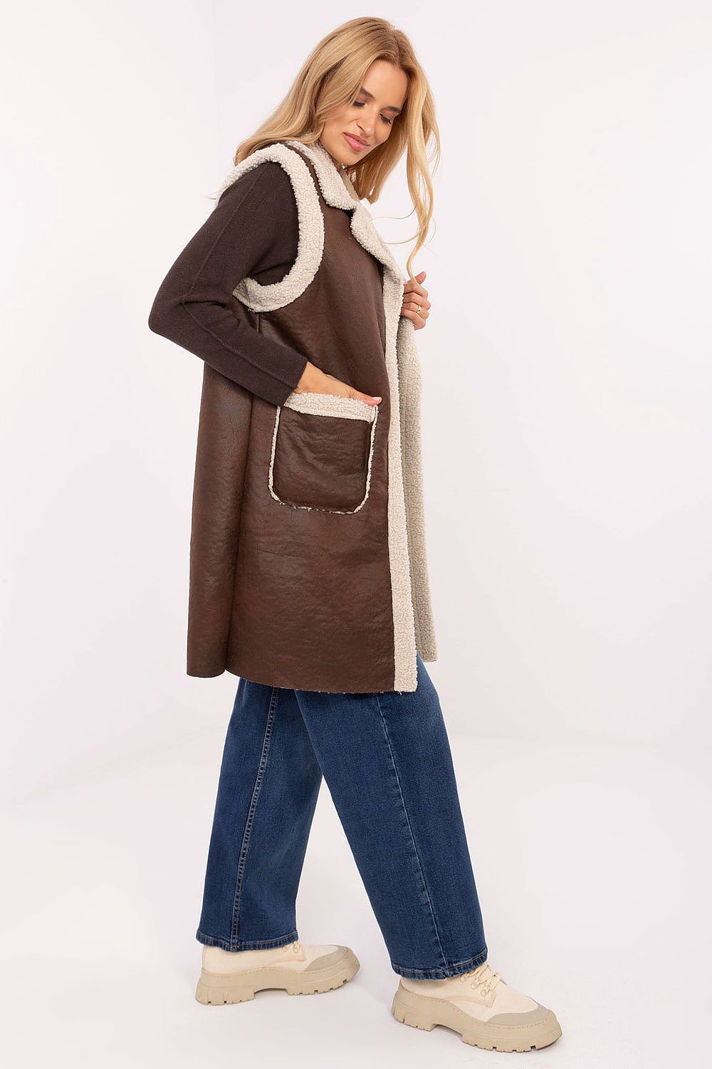 Trendy women's faux fur vest, 100% polyester, designed for effortless layering in colder seasons by Factory Price.