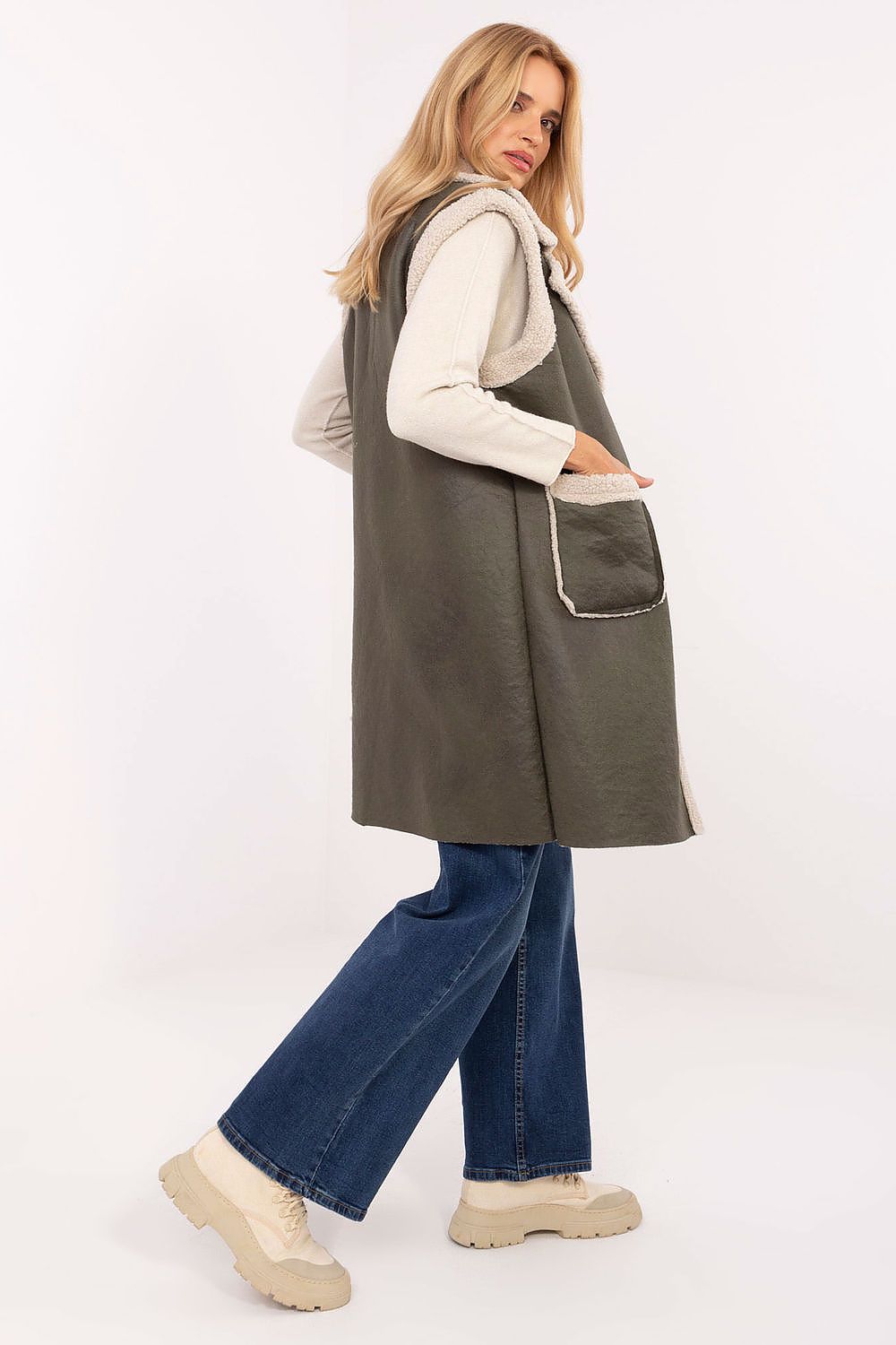 Chic longer length faux fur gilet from Factory Price, featuring practical slip pockets, a minimalist style ideal for casual wear.