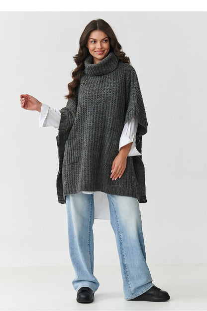 Stylish beige melange women's turtleneck poncho sweater with pockets by Makadamia, designed for comfort and warmth, perfect for creating layered looks in chilly weather.