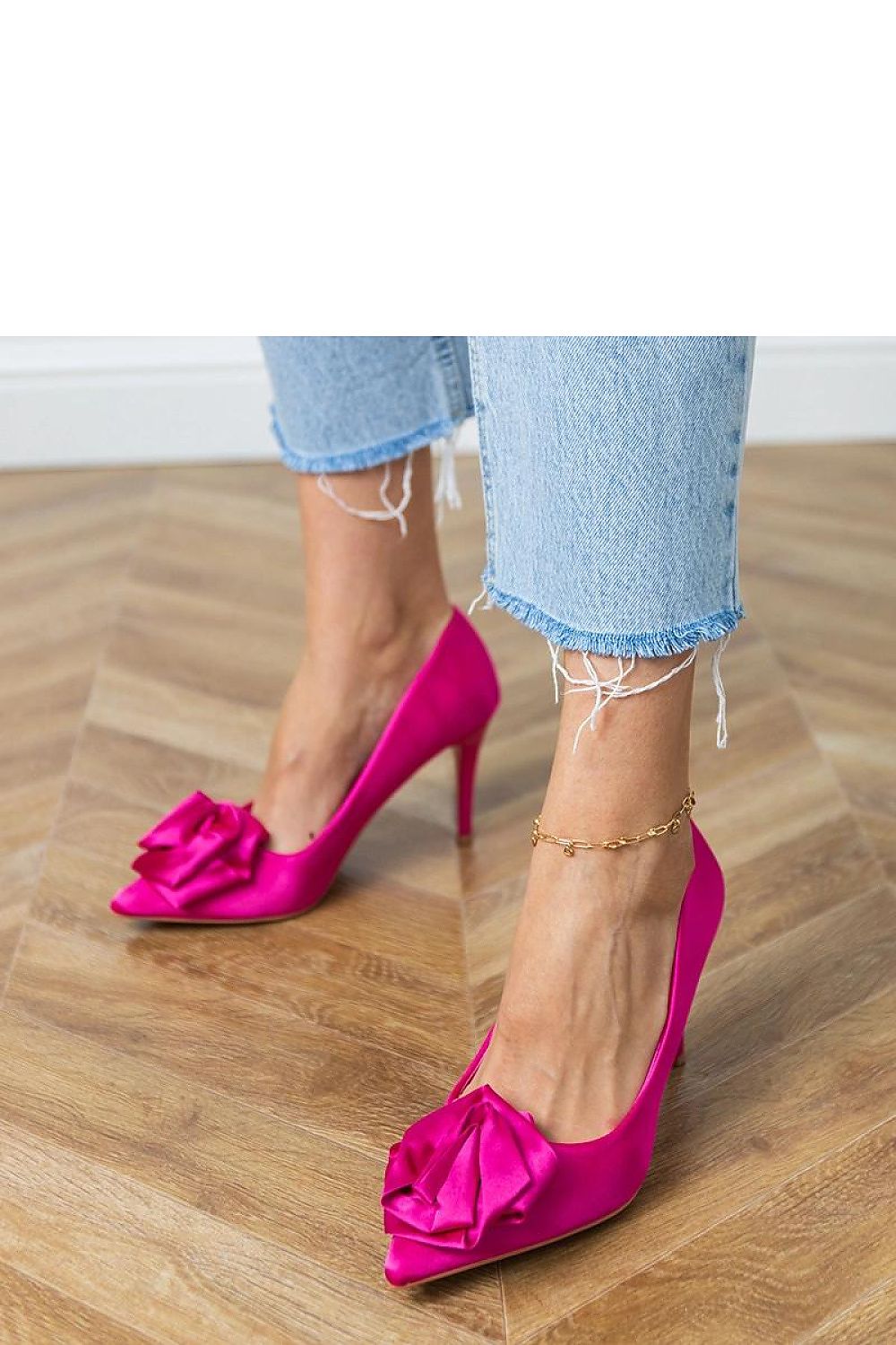 Solea's luxurious satin pumps, 9cm heel with floral detail, crafted for sophisticated and stylish evening events.