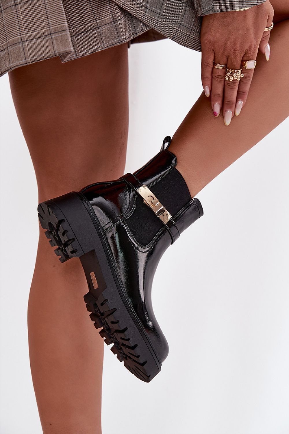 Luxurious women's ankle boots from Step in Style, showcasing an upscale 4 cm heel and chic gold accents, perfect for versatile everyday wear.