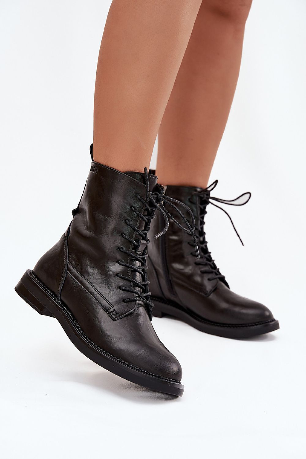 Step in Style elegant women's leather work boots featuring zip and lace design, perfect for luxurious casual wear.