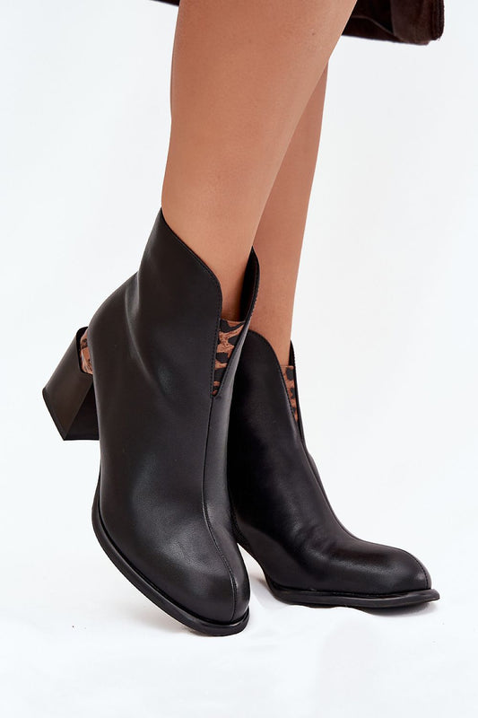 Vinceza Women's Elegant Leopard Print Heel Boots showcasing natural leather and rounded toe design, perfect for versatile styles and colder days.