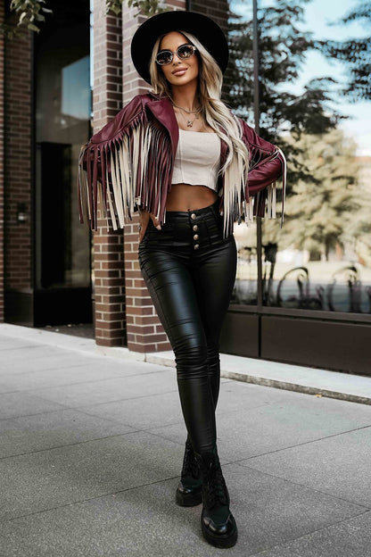 Chic bohemian fringed biker jacket in deep burgundy, designed by Numoco, perfect for adding a bold accent to any outfit.