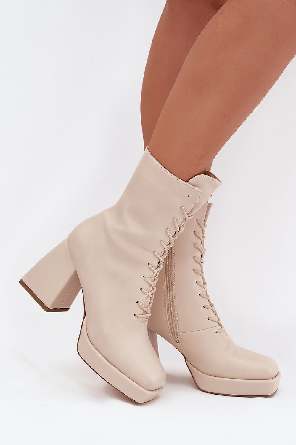 Stylish women's eco-leather ankle boots by Step in Style featuring a designer column heel, lace-up and zip closure for an elegant look.