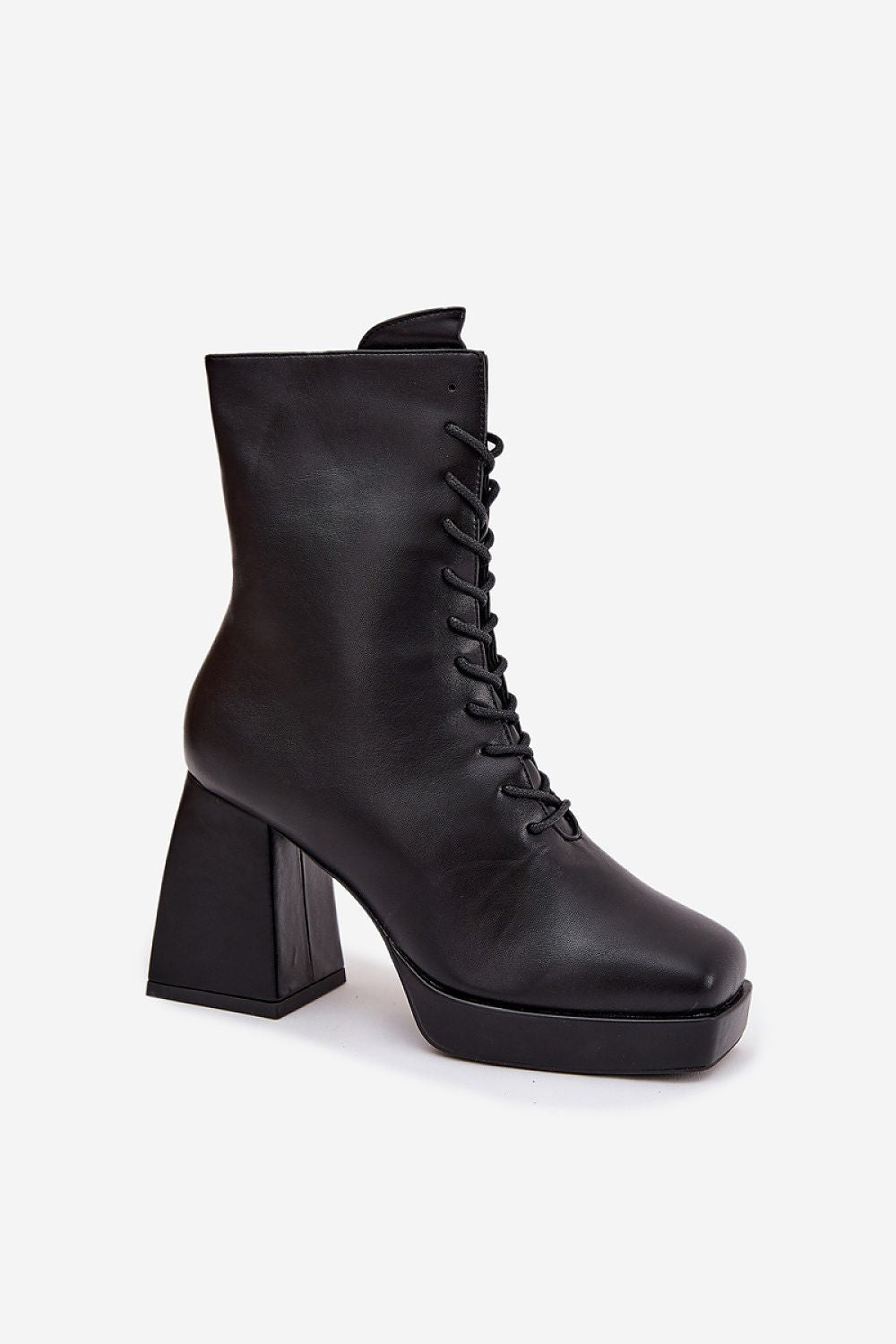 Step in Style's women's ankle boots showcased in a trendy lace-up design, embodying eco-friendly luxury with a stable column heel.