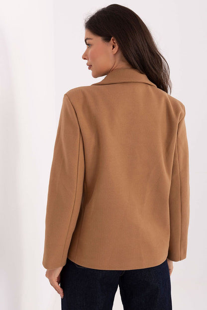 Back view of the elegant double-breasted women's coat from Rue Paris, emphasising its timeless cut and fashionable appeal.
