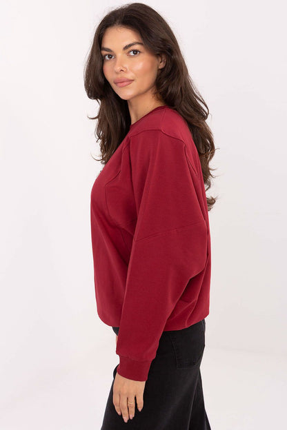 Fashionable women’s long sleeve sweatshirt by Rue Paris, featuring a classic round neckline, ideal for versatile styling.