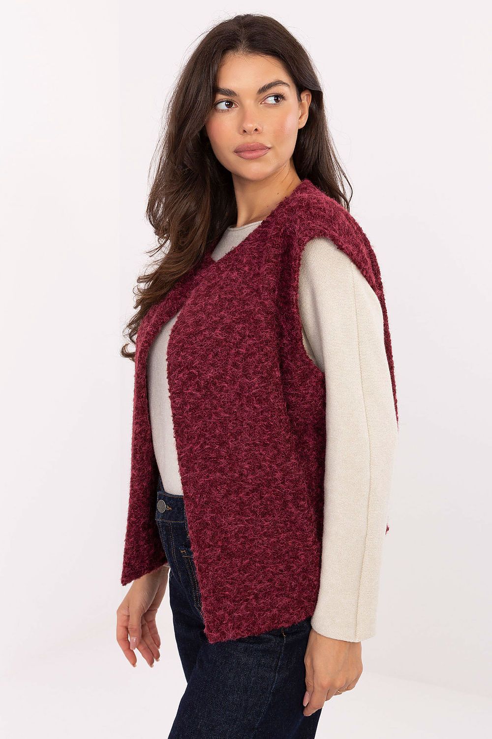 Trendy women's boucle vest by Rue Paris, featuring a unique textured design and practical slip pockets, perfect for autumn-winter layering.