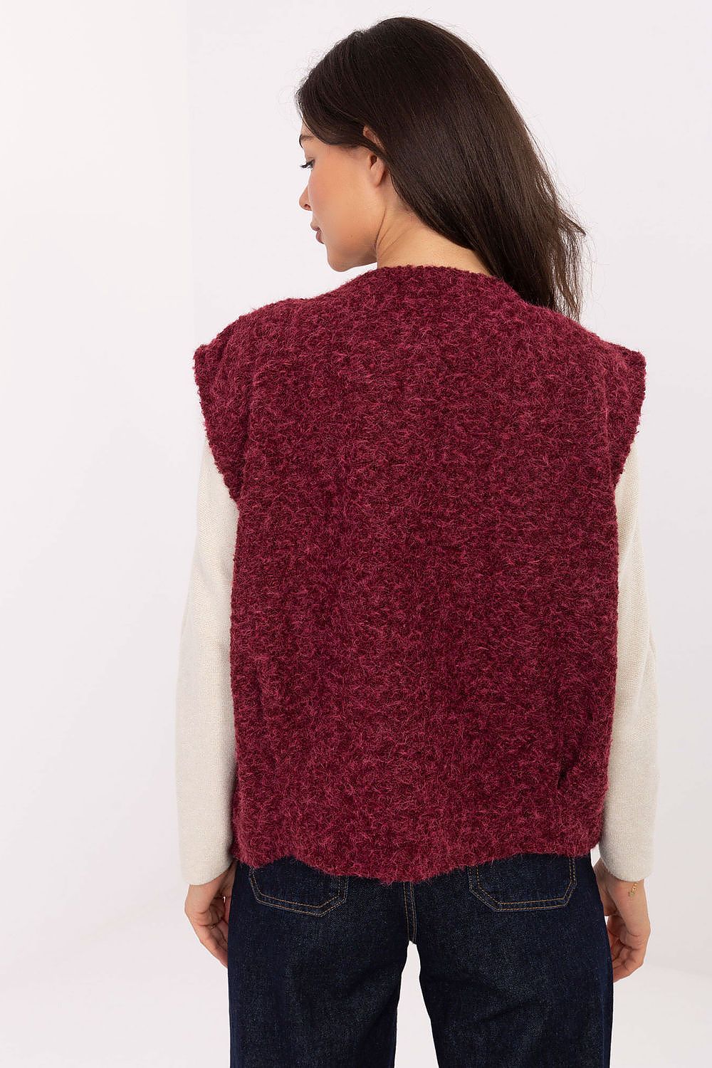 Stylish Rue Paris boucle vest showcasing its elegant silhouette and sophisticated fabric, ideal for casual yet chic outfits.