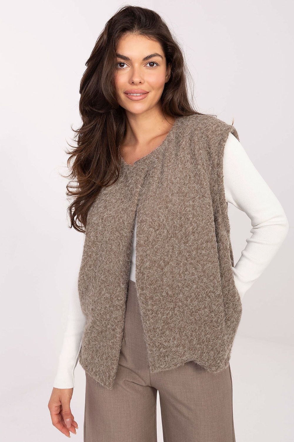 Autumn-winter fashion statement, a luxurious women's boucle vest from Rue Paris, designed for comfort and elegance.
