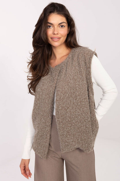 Autumn-winter fashion statement, a luxurious women's boucle vest from Rue Paris, designed for comfort and elegance.