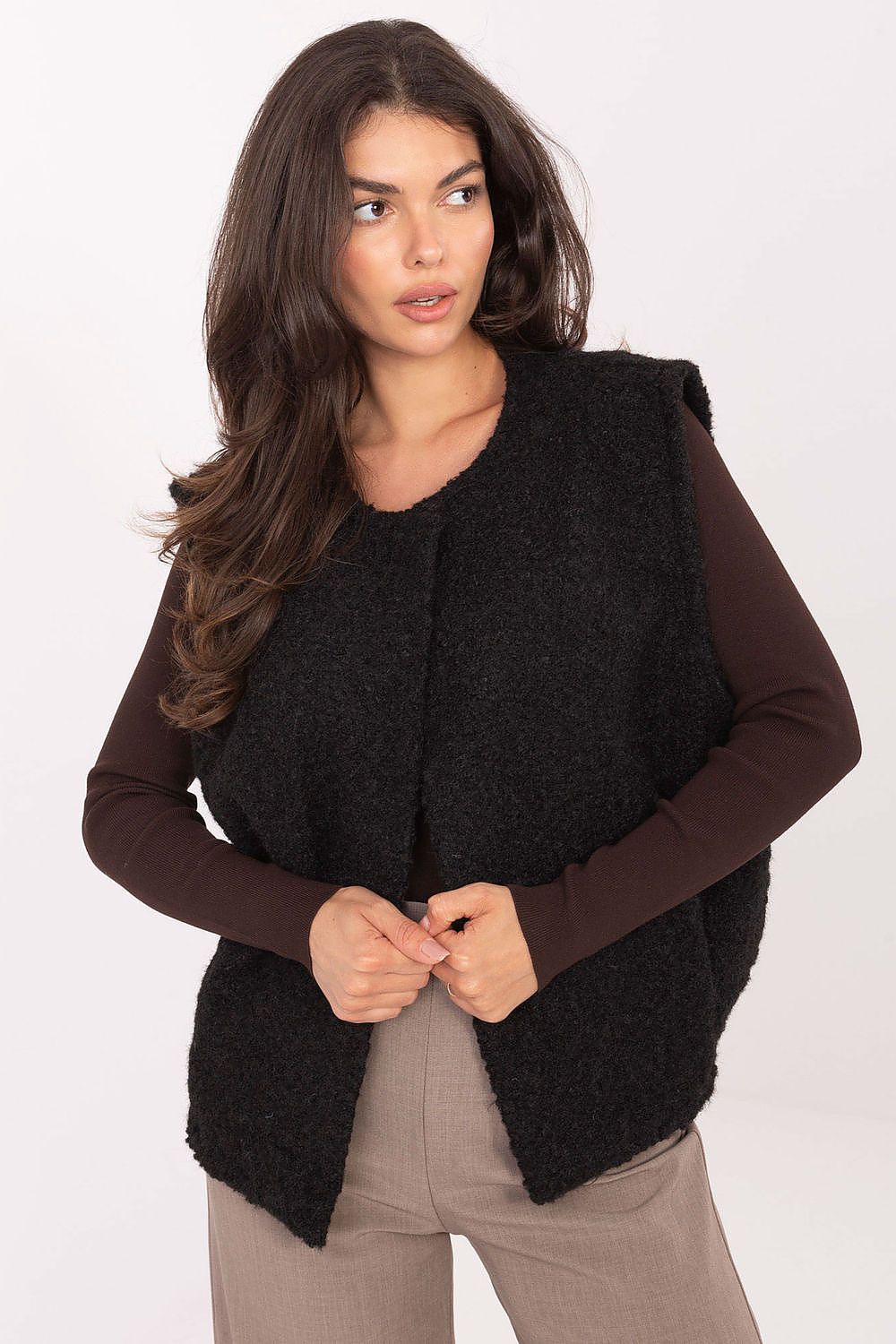 Elegant polyester boucle vest by Rue Paris, showcasing a stylish texture and a comfortable fit for everyday wear during chilly seasons.