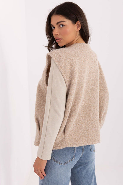 Elegant casual outer layer women's vest from Rue Paris, showcasing a unique textured design, ideal for layering.