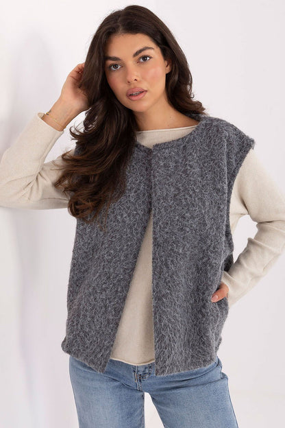 Chic polyester boucle vest by Rue Paris, designed for comfort and style in cooler seasons.