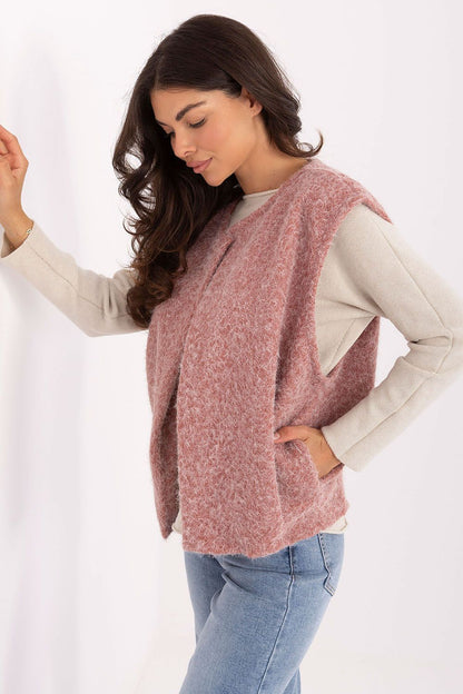 Chic Rue Paris boucle vest in a stylish silhouette, showcasing a textured fabric ideal for sophisticated everyday wear.