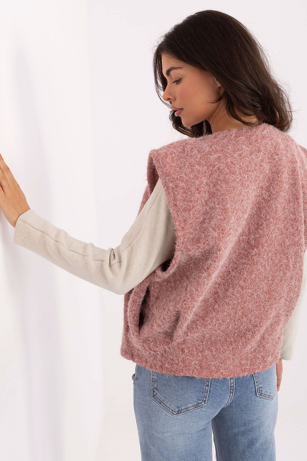 Fashion-forward women's vest by Rue Paris, crafted from 100% polyester, perfect for adding a fashionable touch to autumn outfits.