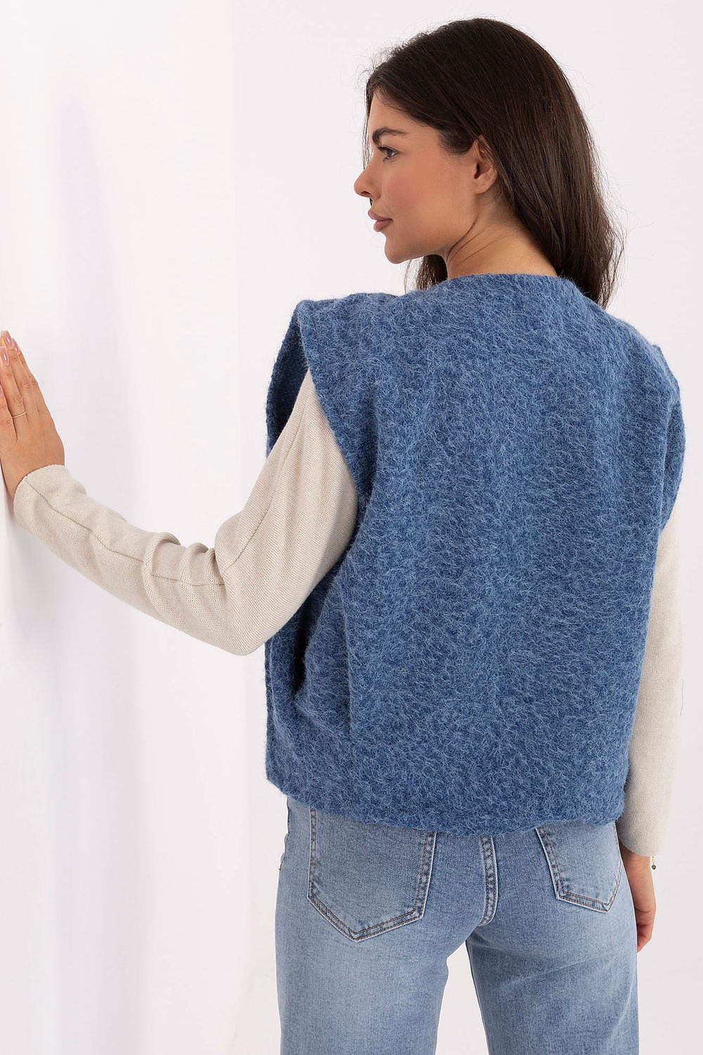 Trendy women's boucle vest with pockets by Rue Paris, showcasing a luxurious texture and casual elegance, perfect for autumn-winter layering.