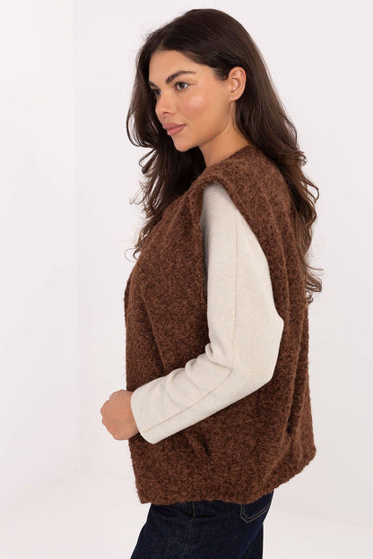 Rue Paris boucle vest for women, combining comfort and style with its unique fabric texture and versatile pocket design, perfect for everyday wear.
