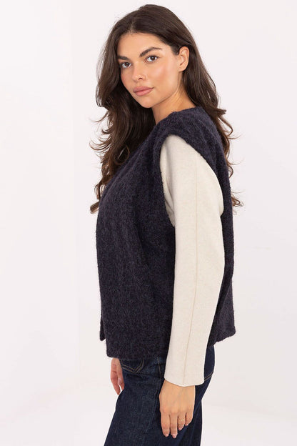 Luxurious women's boucle vest by Rue Paris, featuring an elegant textured design, slip pockets, and perfect for layering during the autumn-winter season.