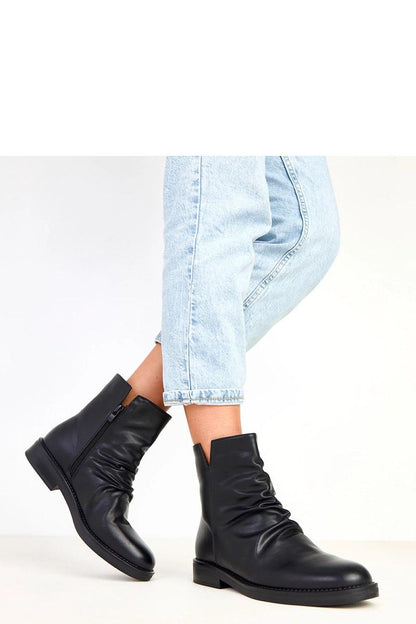 Close-up of Solea Women's Classic Ankle Boots, featuring a practical zipper closure and soft fabric interior for ultimate comfort.