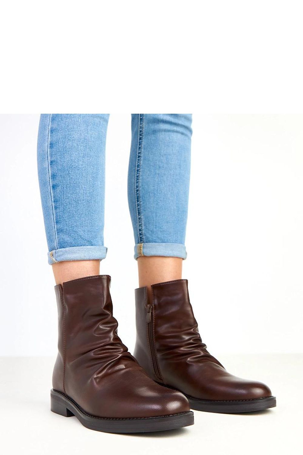 Side view of Solea Women's Classic Ankle Boots, highlighting the 3 cm heel and classic round toe for a timeless look.