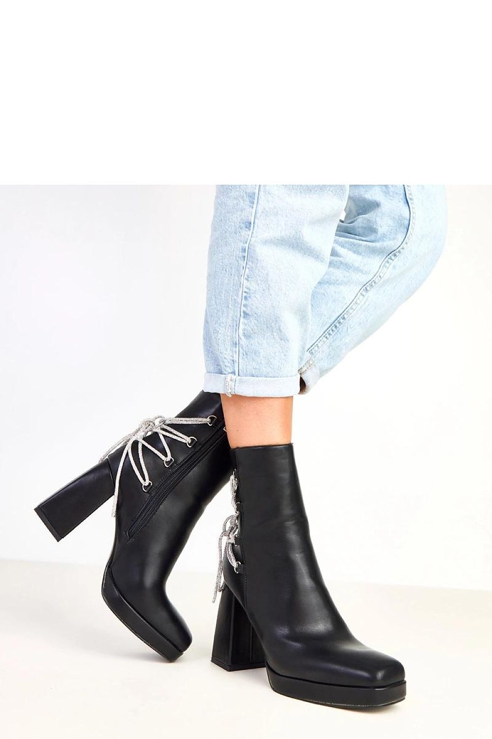 Stylish women's eco-leather ankle boots from Solea featuring a dazzling zircon lace-up design, combining luxury and comfort with a round toe and a chic 10 cm pillar heel.