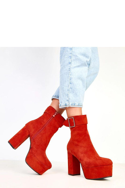 Close-up view of Solea Women's ankle boots featuring eco-friendly suede texture and a practical zipper closure, ideal for transitional seasons with refined elegance.