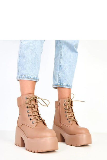 Stylish chunky ankle boots by Solea crafted from durable ecological leather, showcasing a solid 9cm heel and a 5cm platform for elevated comfort.
