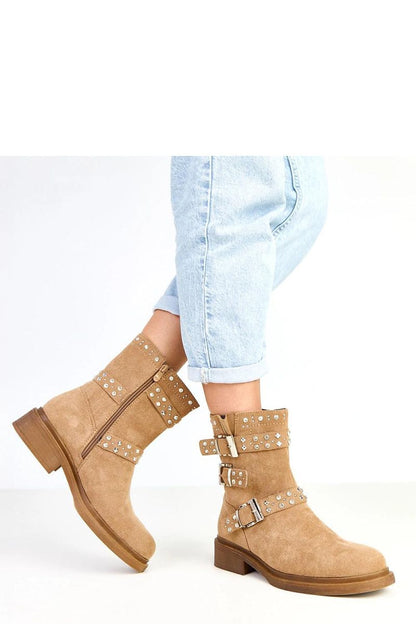 Stylish women's ankle boots by Solea, highlighted with eco suede and modern buckles, designed for ultimate comfort and sophistication.