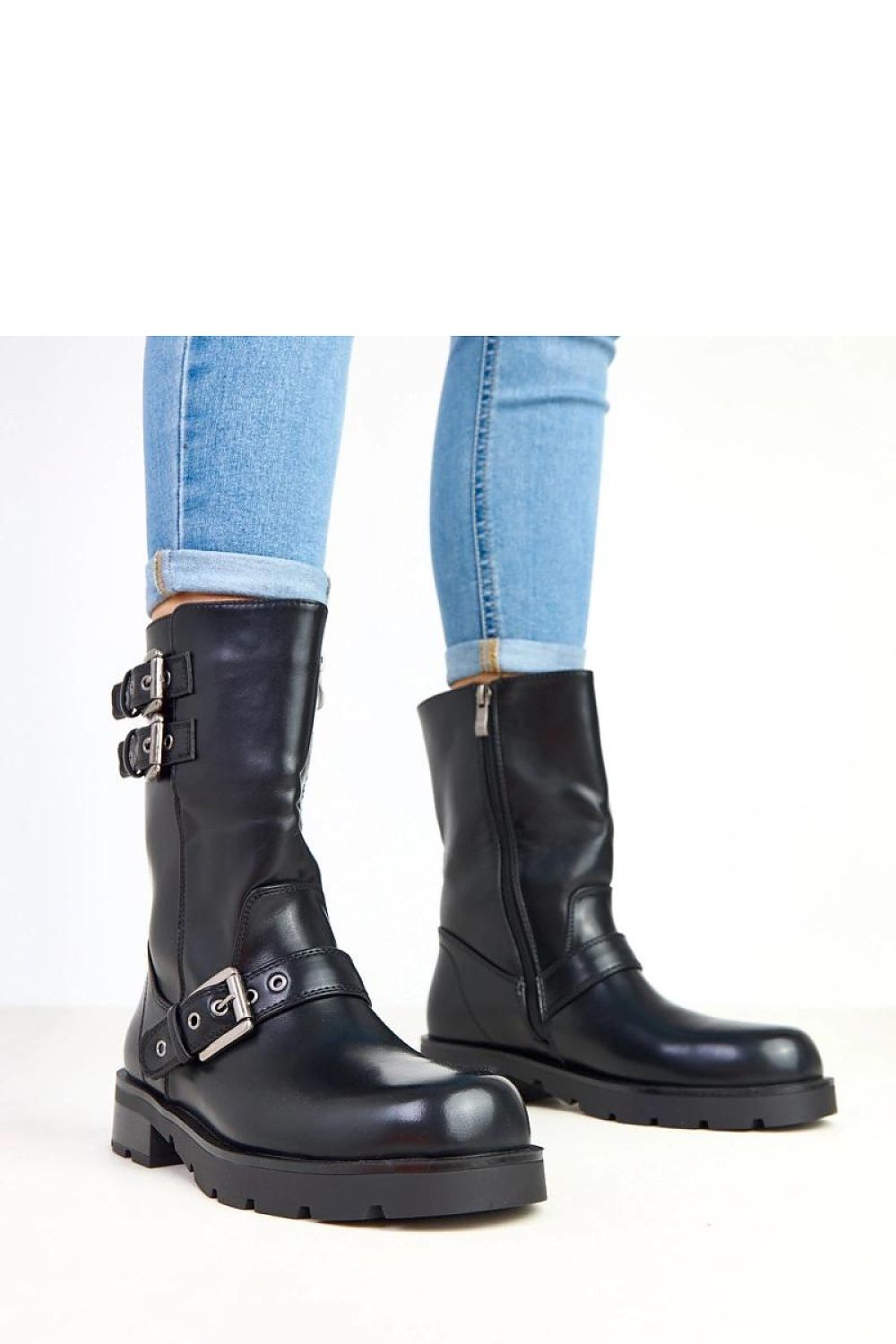 Elegant Solea women's ankle boots in ecological leather, showcasing stylish decorative buckles and a rounded toe, perfect for chic urban outfits.