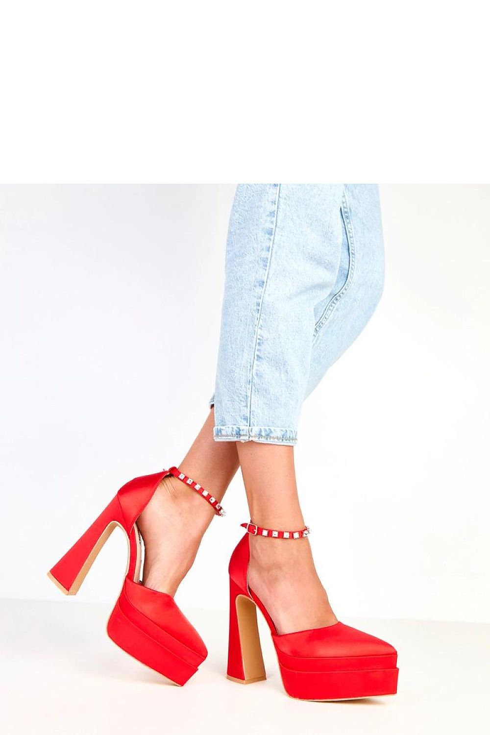 Elegant Solea women’s heel pumps displayed on a luxurious setting, highlighting the 15cm heel and satin fabric for a glamorous look.