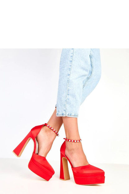 Elegant Solea women’s heel pumps displayed on a luxurious setting, highlighting the 15cm heel and satin fabric for a glamorous look.