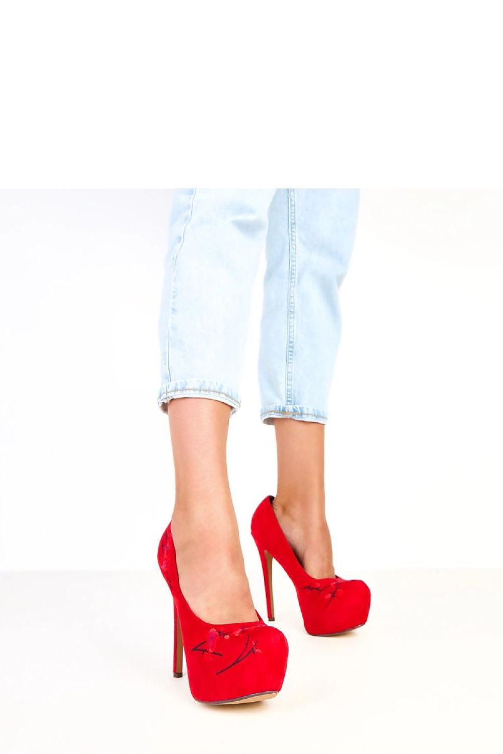 Close-up of Solea women's high heels showcasing the stylish decorative flower details on soft ecological suede.