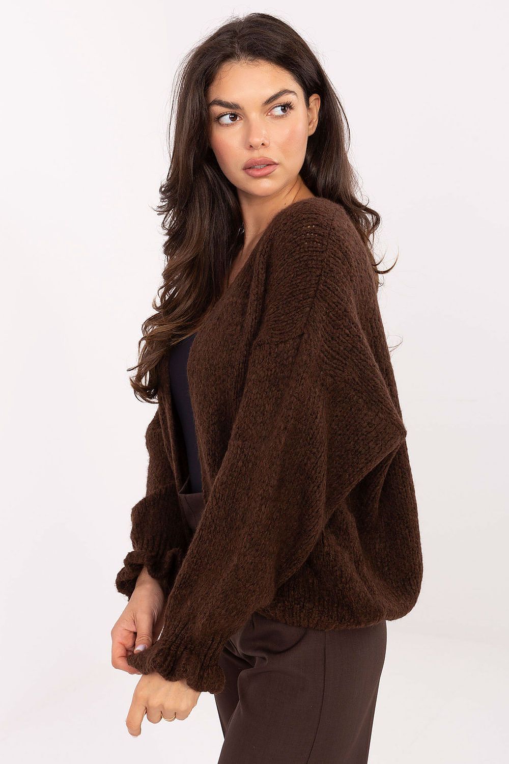 Elegant Rue Paris cardigan displayed on a model, demonstrating versatile styling options for women in EU size 0.