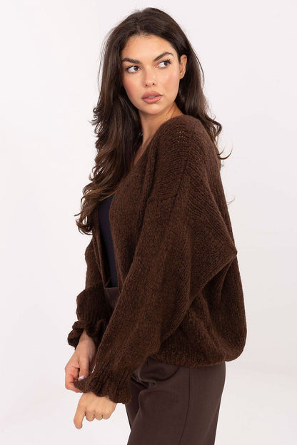 Elegant Rue Paris cardigan displayed on a model, demonstrating versatile styling options for women in EU size 0.