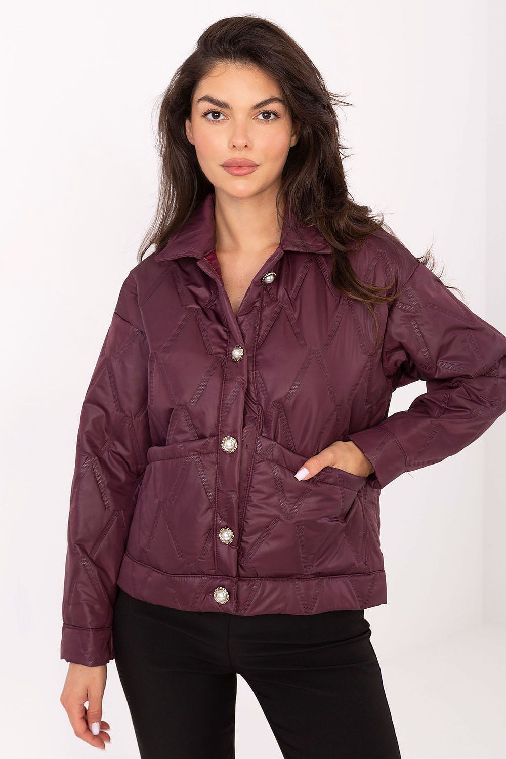 Close-up view of the elegant button closure of Rue Paris Women's Quilted Jacket, highlighting its classic style and luxurious finish.