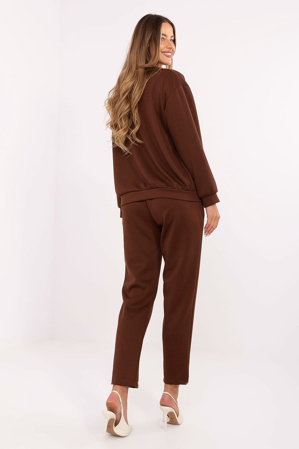 Stylish tapered pants from the Rue Paris luxury women's casual set, crafted from soft viscose and elastane, highlighting the decorative belt and modern cut.