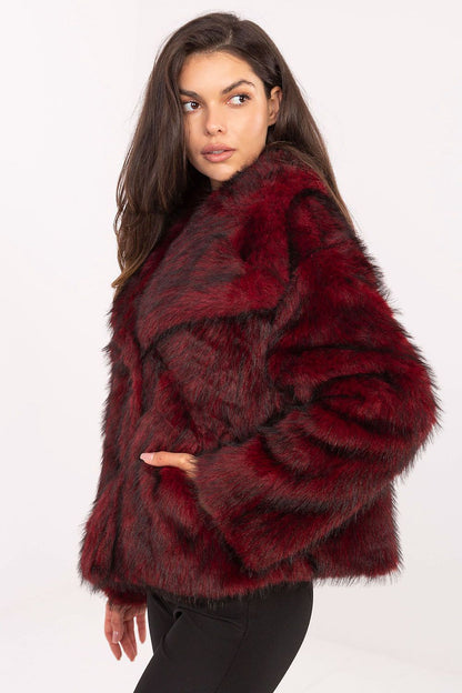Beautifully crafted Rue Paris fur jacket, featuring a classic lapel collar and standard length, designed for fashionable elegance and versatility.