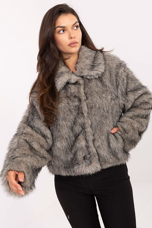 Luxurious women's fur jacket by Rue Paris with a wide collar, showcasing an elegant autumn/winter design, perfect for chic outings.