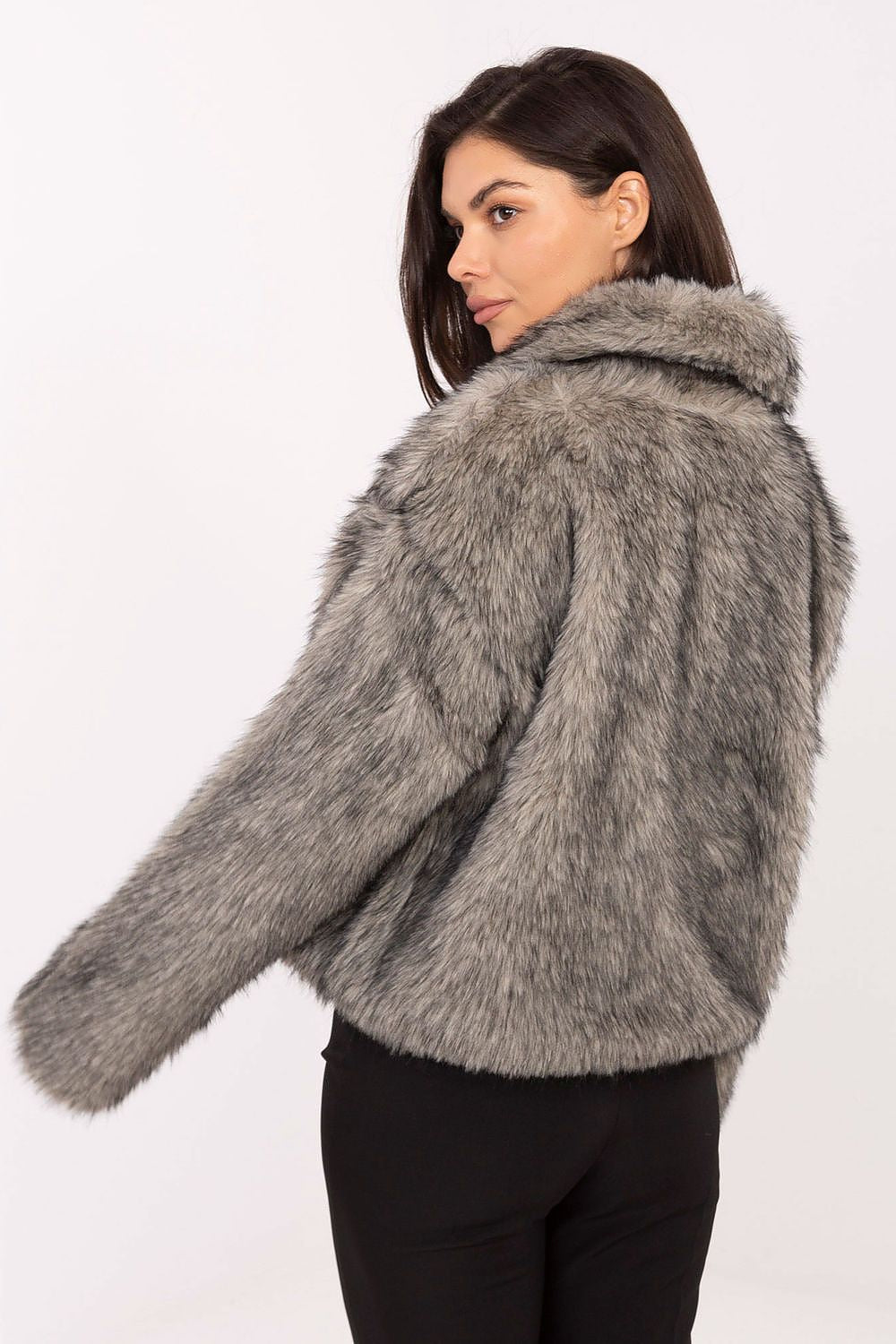 Chic and stylish Rue Paris women's fur jacket, highlighting slip pockets and a sophisticated look for special occasions.