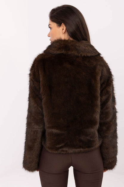 Model wearing the chic Rue Paris women's fur jacket with wide collar, fitted silhouette, and practical pockets, ideal for upscale casual and formal occasions.