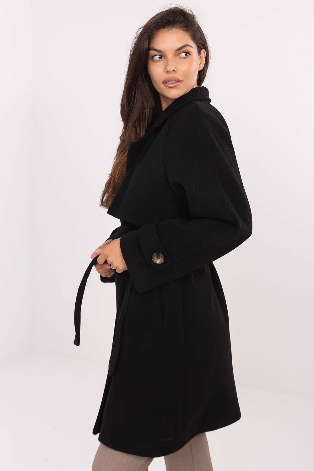 Elegant women's transitional coat by Rue Paris featuring a chic double-breasted design with lapels, accentuated with a waist tie, perfect for autumn and spring styling.
