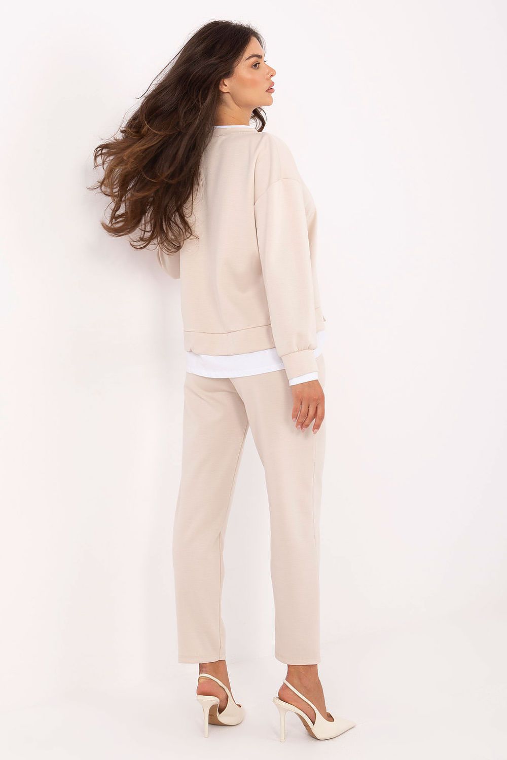 Stylish close-up of Rue Paris women's casual set, showcasing a comfortable round neck sweatshirt and tailored high-waisted trousers, perfect for chic everyday wear.