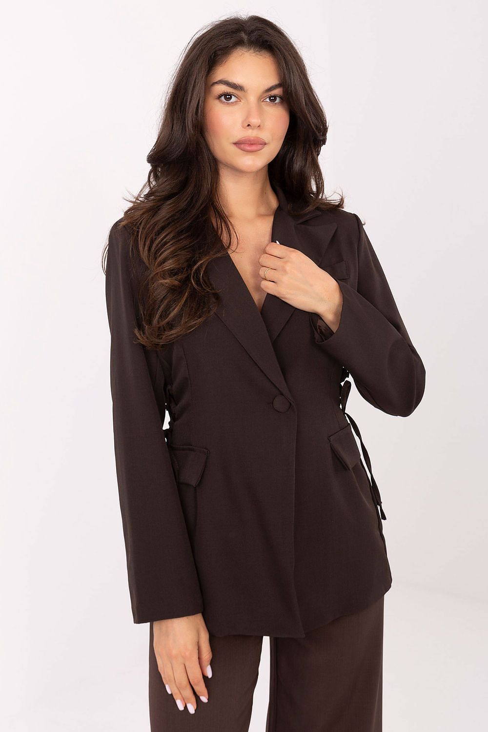 Model wearing Italy Moda elegant blazer outdoors, illustrating versatility and chic styling suitable for various outfits.