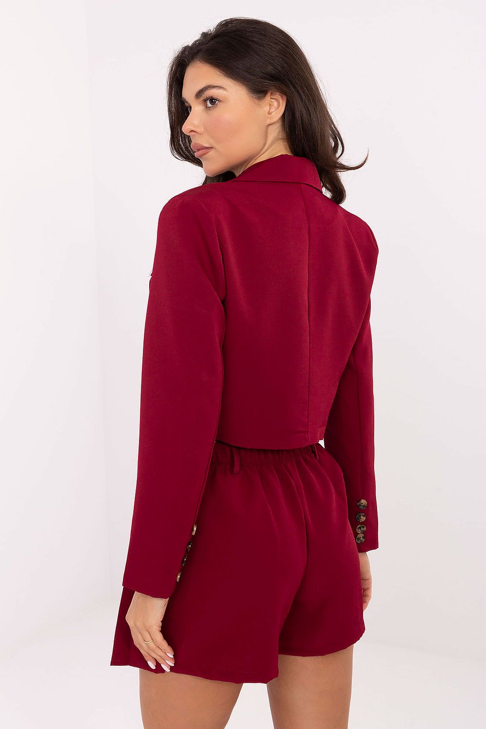 Chic women's jacket and skort set, perfect for formal outings, crafted by Italy Moda.