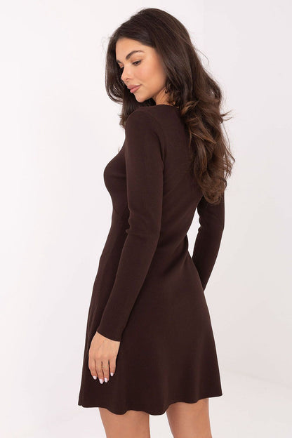 Elegant knitted mini dress for women by Factory Price, featuring a sleek V-neckline and long sleeves, perfect for a luxury casual look.