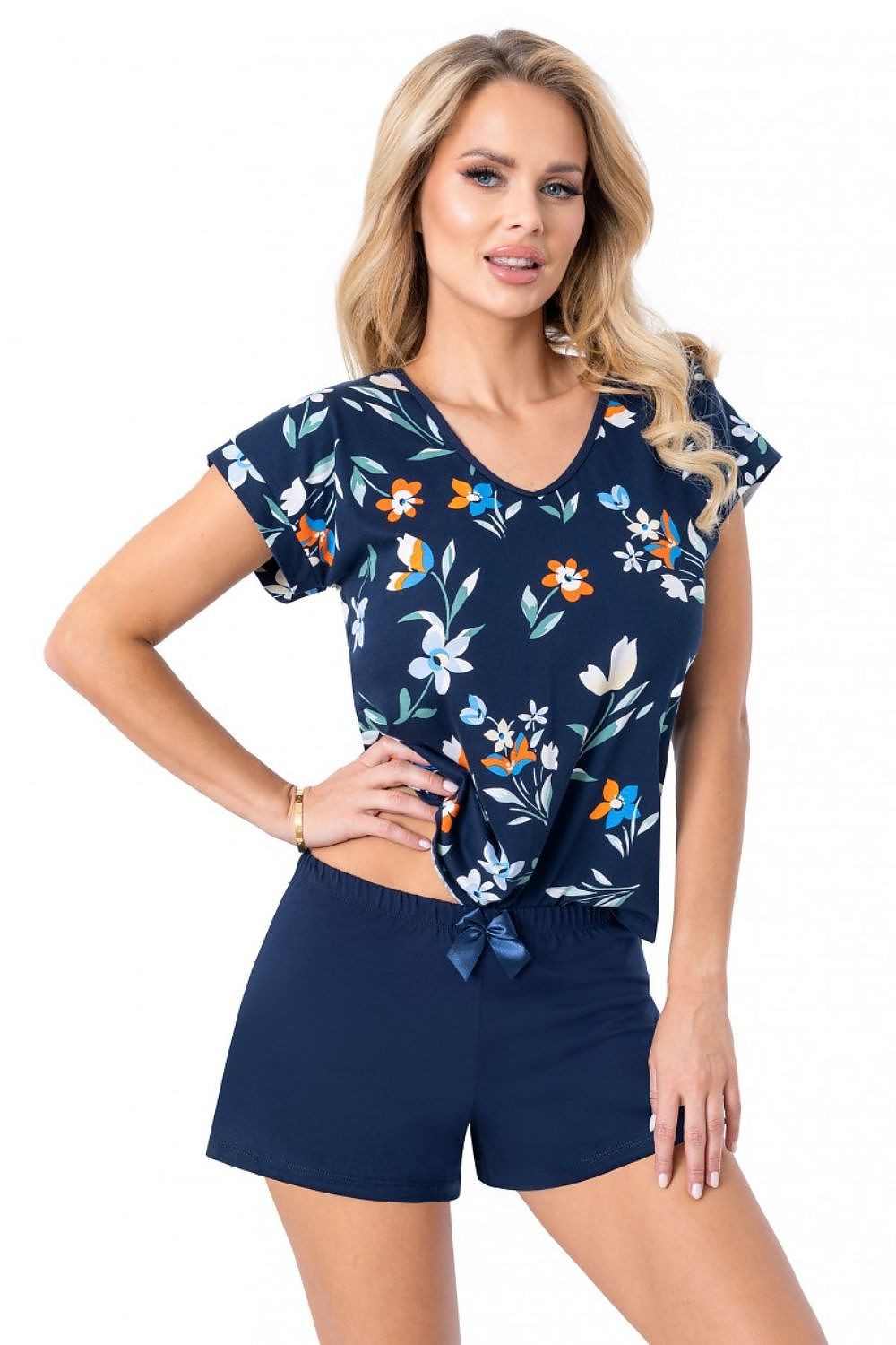 Luxury women's cotton pyjamas set by Donna featuring short sleeves and shorts, elegant V-neck design, ideal for comfortable sleep.