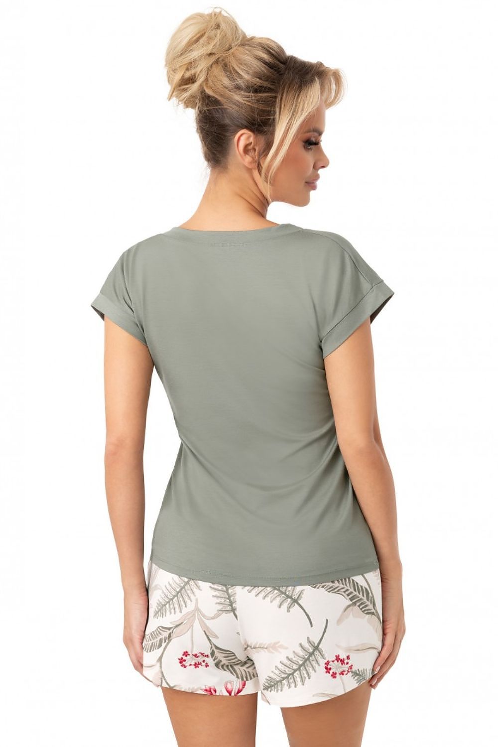 Luxurious women's pyjamas shorts set by Donna, showcasing a comfortable V-neck blouse and delightful printed shorts paired with an elastic waistband and bow.